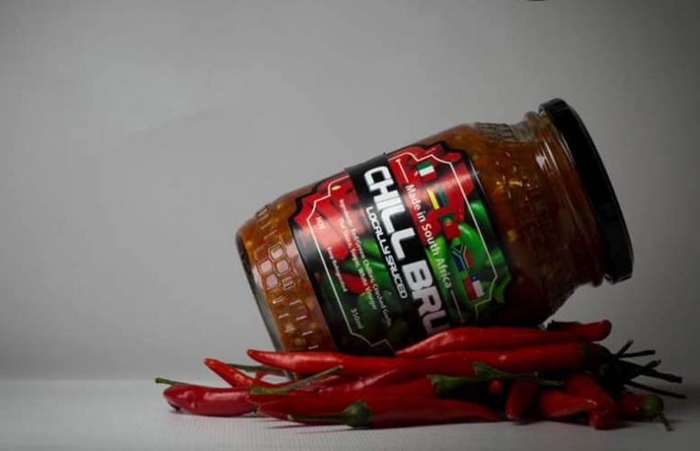 CHILL-BRU chilli sauce jar with fresh chillies
